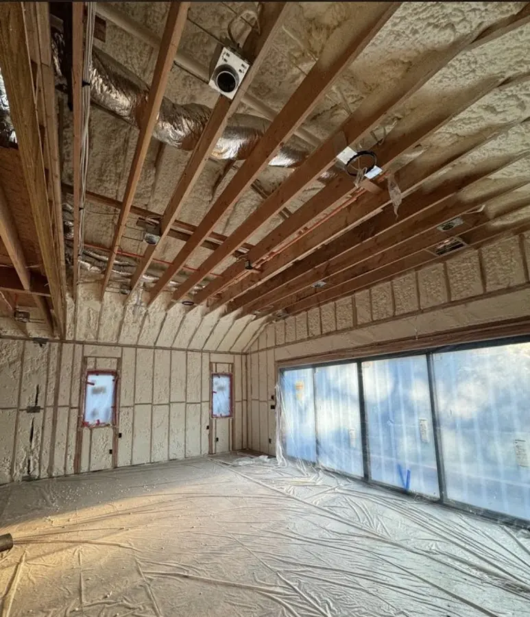 Interior walls and ceiling insulated with spray foam during new construction in Dudley